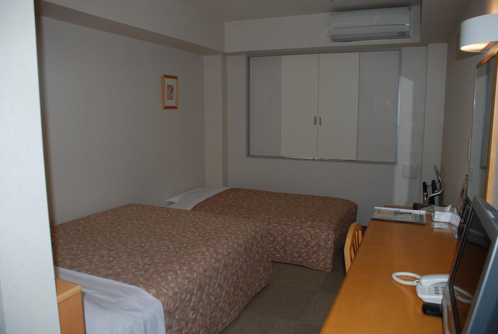 Best Inn Uozu Pokoj fotografie